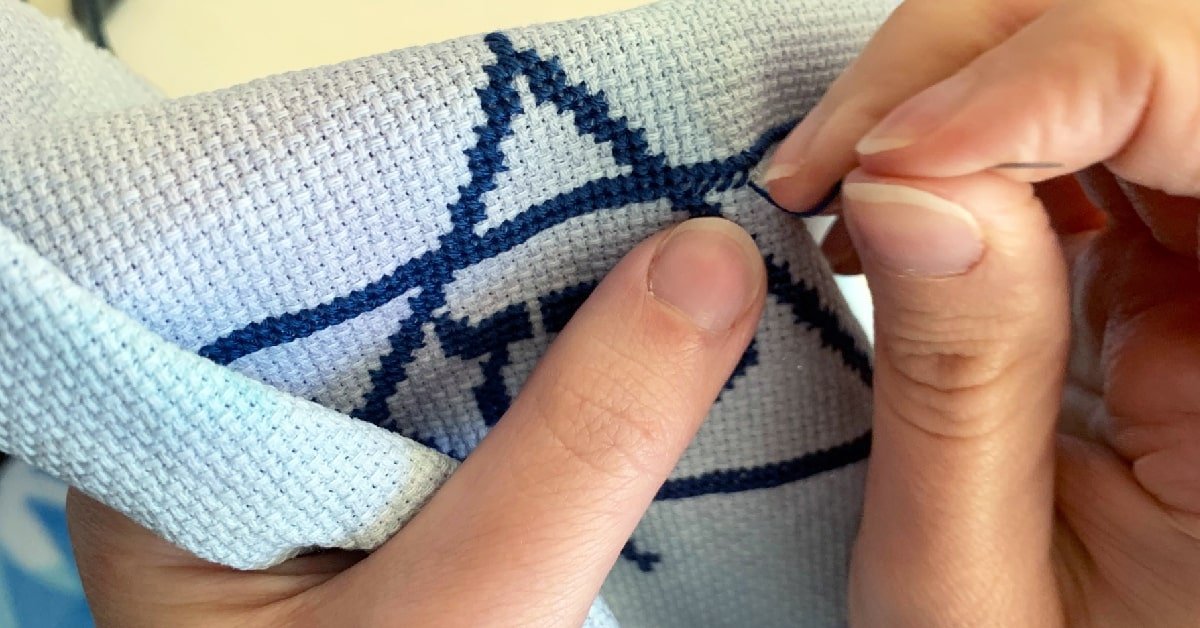 Cross stitching in hand