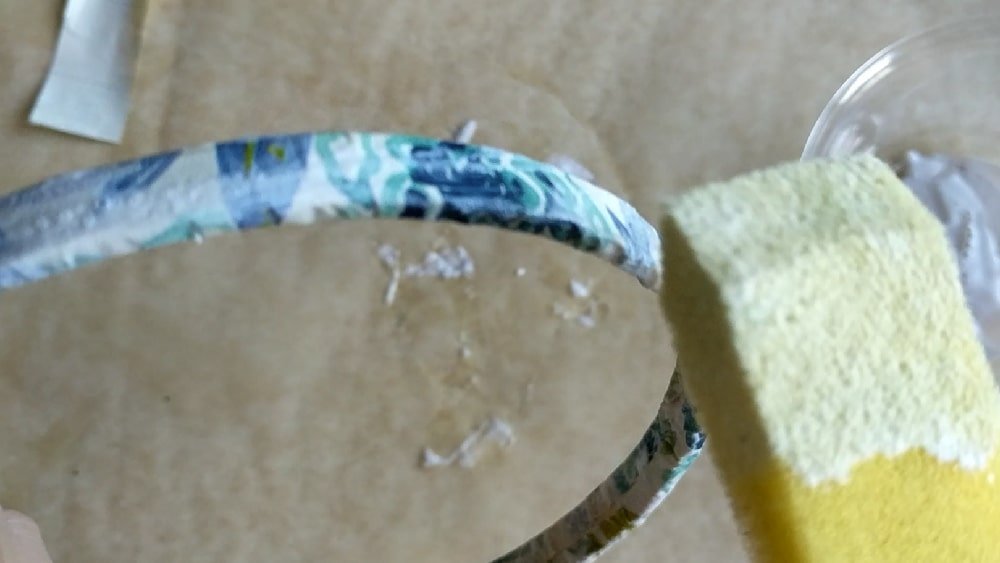 Seal the outside of the hoop with mod podge