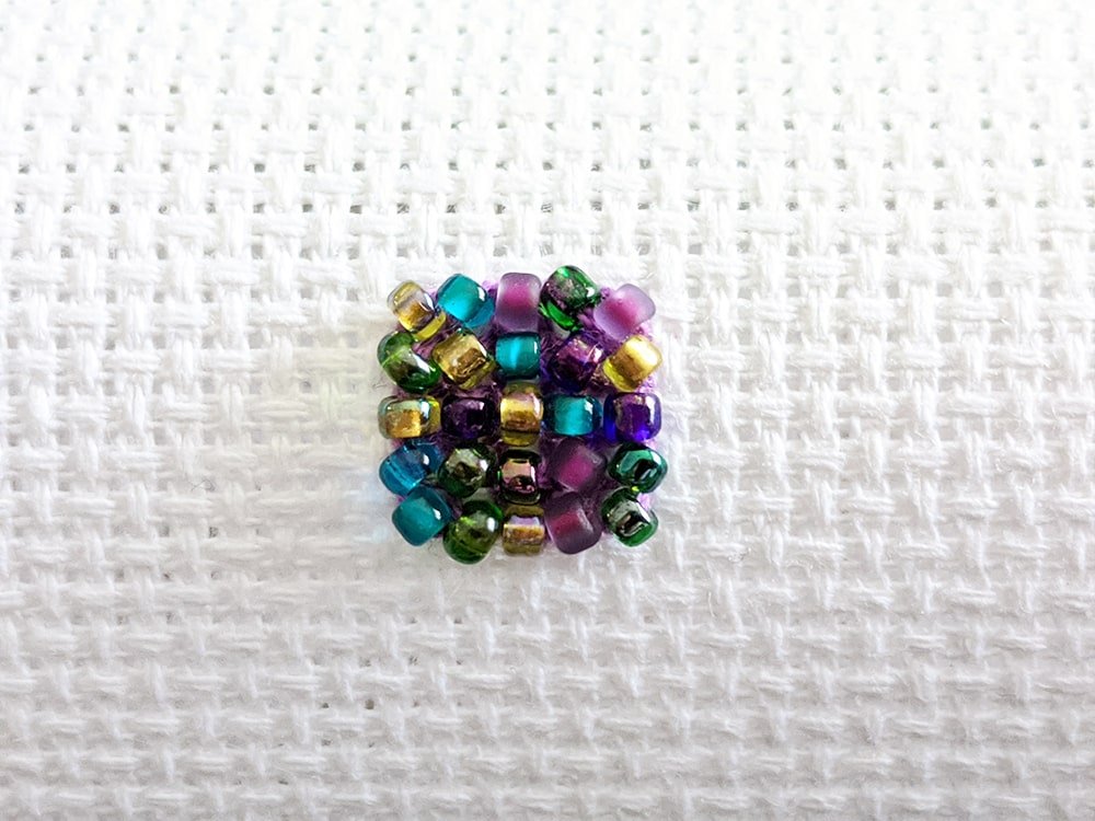 Beading seed beads directionally