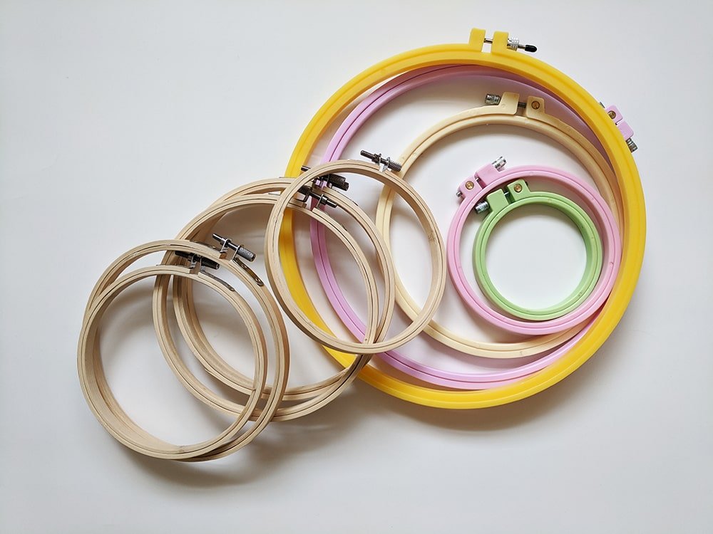 Various sizes of wooden and plastic embroidery hoops